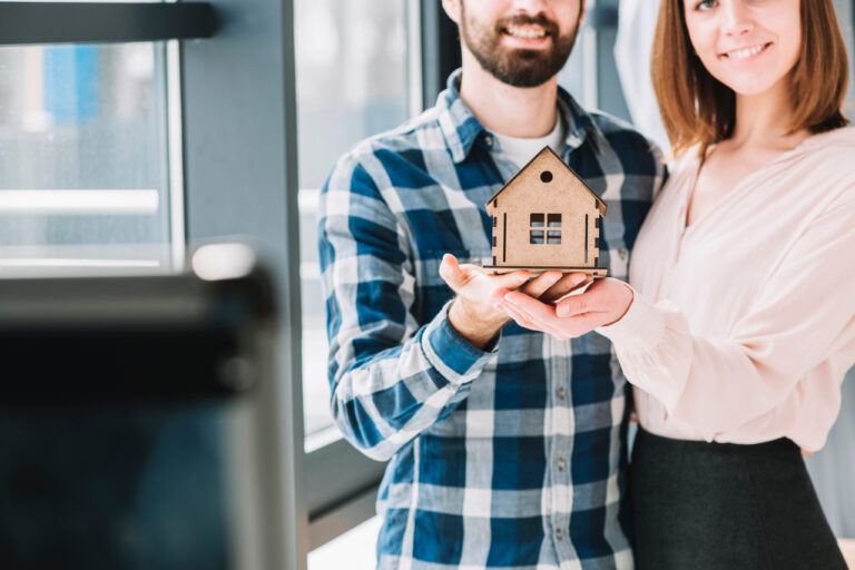 crop-couple-demonstrating-house